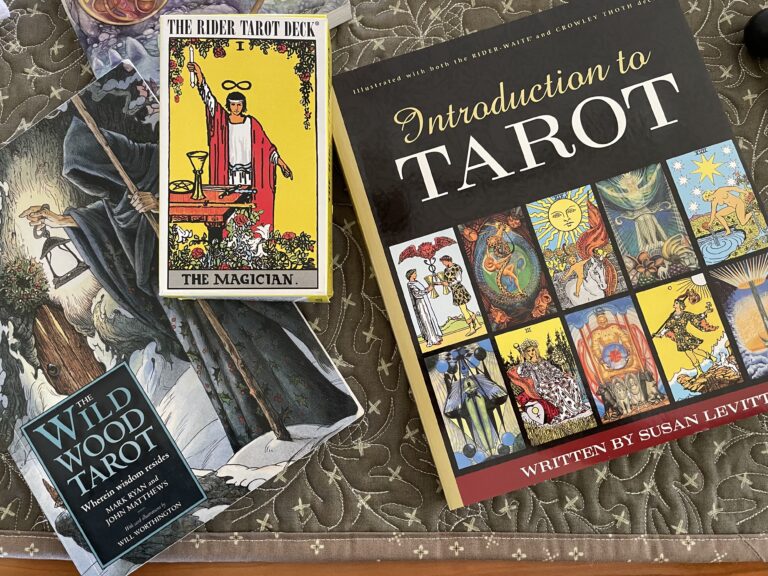 Book covers for "Introduction to Tarot" and "Wild Wood Tarot"